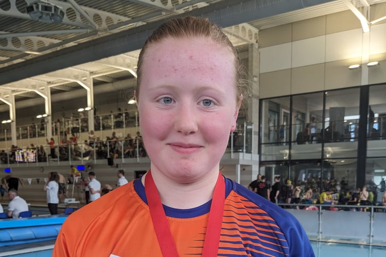 Elsa Finney from Penglais with one of her many medals from the meet