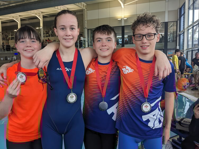 Gold Medalist in the 200m medley relay, Gwerfyl, Seren, Jack and vice captain Oli.