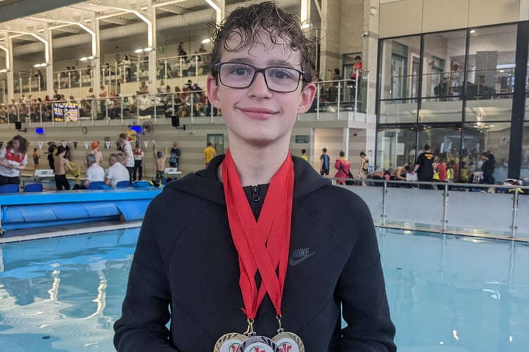 Wilf Thomas from Penglais with his haul of medals