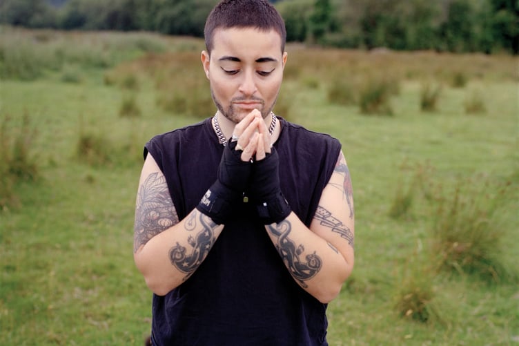 'The land isn’t binary and neither am I' multimedia exhibition pairs portraits of drag king Kaan K with poetry exploring boundaries and binaries
