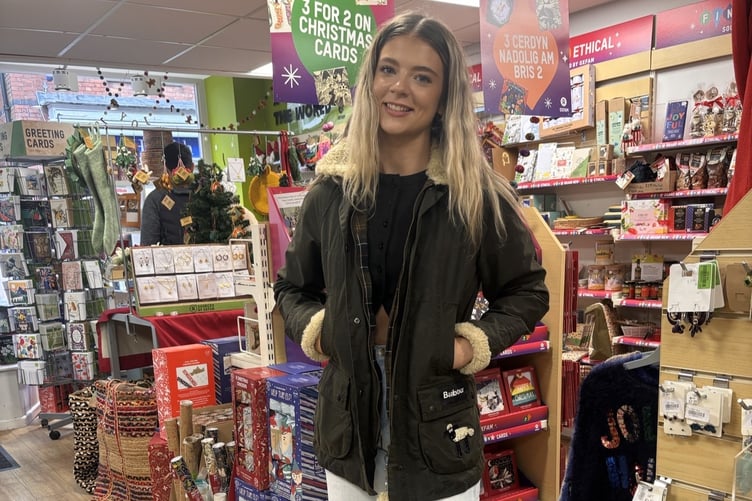 Customer Amelia Hall is the proud owner of a rare Baa-bour Shaun the Sheep jacket after a treasure hunt in the Oxfam Cardigan branch