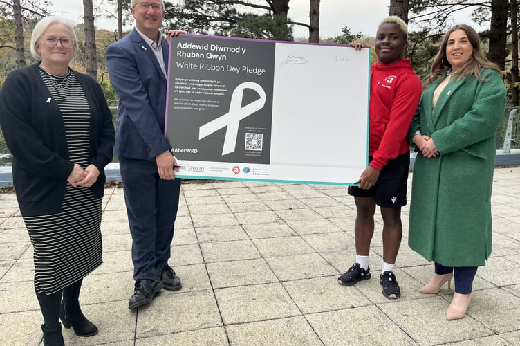 Pictured Left to right: Elize Freeman, Deputy Director and Co-Lead of Dewis Choice, Professor Jon Timmis, Vice-Chancellor Aberystwyth University, Bayanda Vundamina, President of Undeb Aber and Jess Jackson, Anti-harassment and Violence Coordinator at Aberystwyth University Student Services