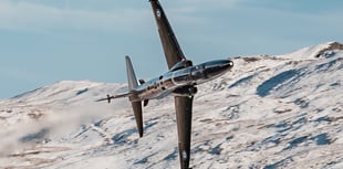 Jaw-dropping pictures show airplanes zooming through a snowy Mach Loop