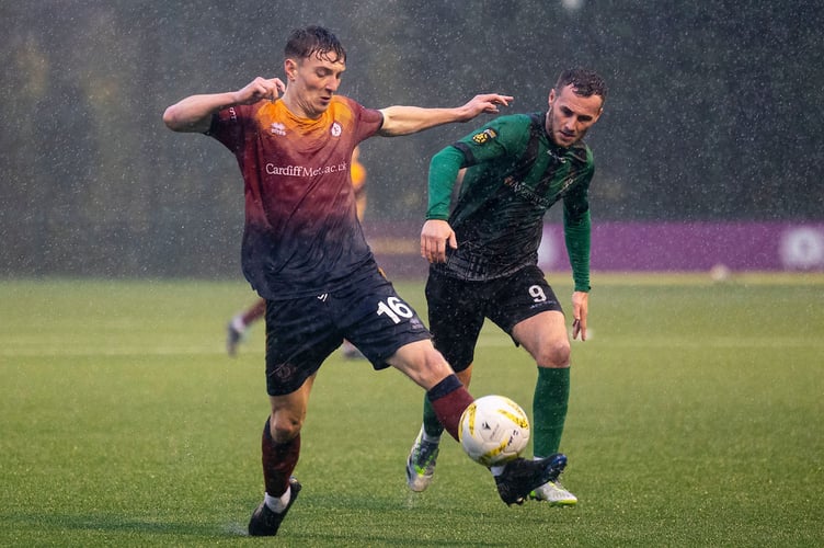 CARDIFF, WALES. 23RD NOVEMBER 2024: 
Chris Craven of Cardiff Met in action against Niall Flint of Aberystwyth.
Cardiff Metropolitan University v Aberystwyth Town in the JD Cymru Premier at Cyncoed Campus on the 23rd November 2024. (Pic by Lewis Mitchell/FAW)