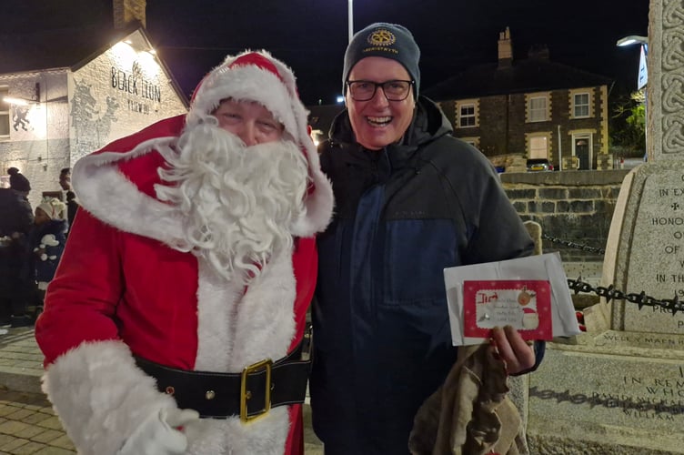 Father Christmas and Richard Griffiths from Ardal Aberystwyth