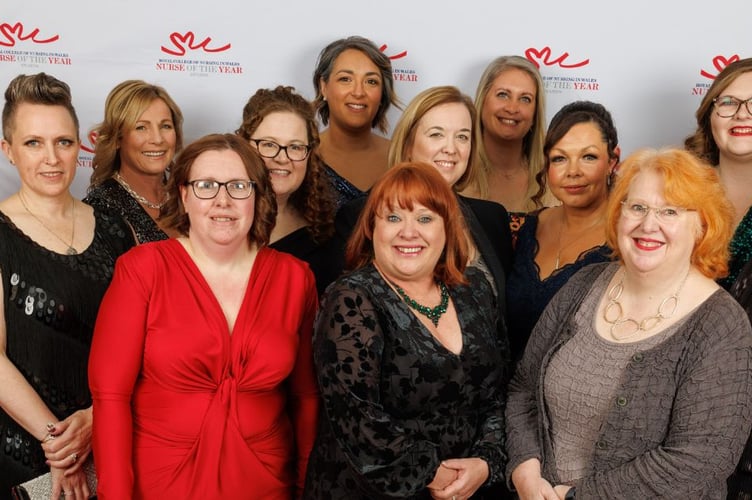 Second from the left, Bianca Oakley, third (in red dress) Donna Major, Claire Hurlin (last on the right)
