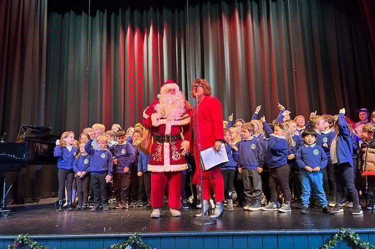 Côr Ysgol Treferthyr with Father Christmas and compère was Bethan Williams Price