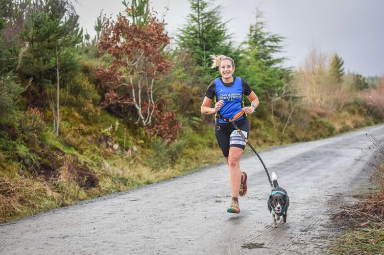 Cara and Bailey doing the 10k Canicross at Betws y Coed