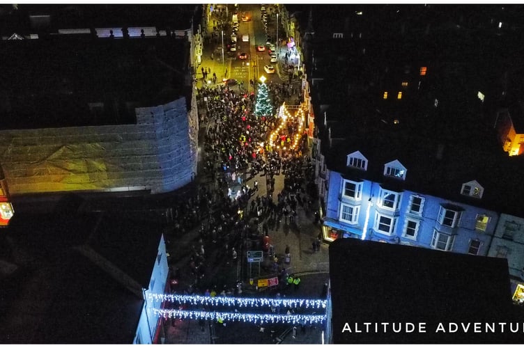Mitchell Moore from social media site Altitude Adventures took this amazing aerial image of the crowd around the tree