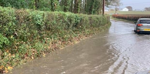 Flood warnings, waterlogged roads and flying tiles