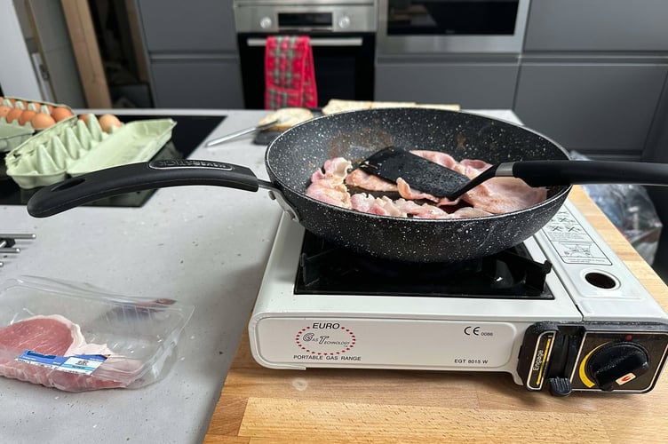 Catrin and Scott Flanders have no power so turned to the camping stove to cook food