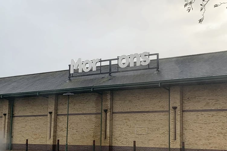The damaged 'Morrisons' sign at Morrisons' supermarket in Aberystwyth, Ceredigion, Wales.  Photo released December 10 2024. Supermarket bosses are rushing to fix an offensive sign exposed as part of Storm Darraghs destruction.Joshua Jones, 26, snapped pictures of the offensive message as he visited the supermarkets location in Aberystwyth, Ceredigion, Wales.His first thought while seeing the sign was that it was the English word morons  referring to stupid people.However, in Wales, the word moron can also have a different meaning  translating into English as carrot.
