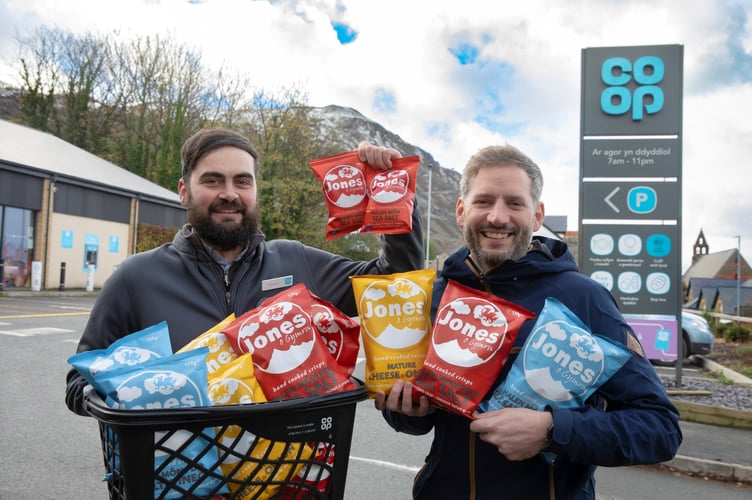 Pictured are Connor Venables Penmaenmawr Coop Store Manager with Jamie Hughes, Director at Bwydydd Madryn. Photo: Mandy Jones