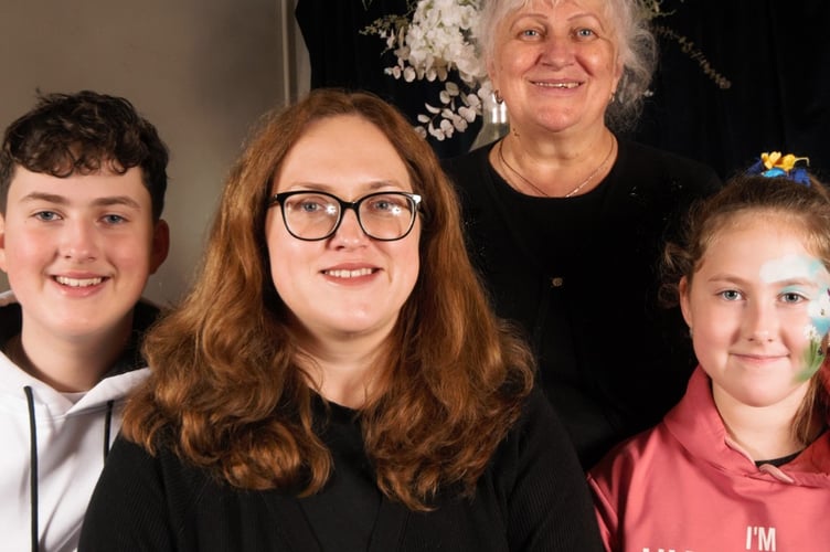 Marta Burak with her daughter Khrystyna Fedechko and grandchildren Taras and Yuliana Fedechko.