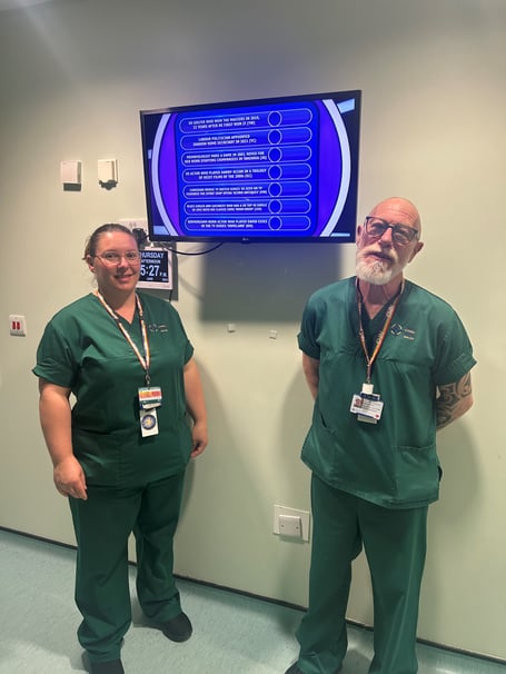 Staff from Withybush A&E with one of the TVs