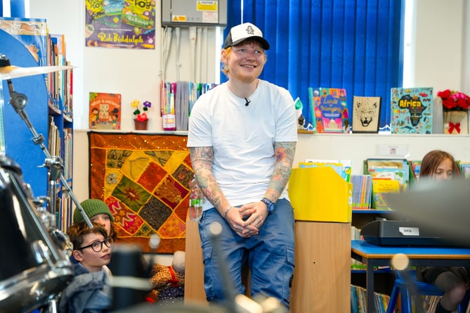 Ed Sheeran surprised teachers and pupils at Fairlight Primary School in Brighton with a surprise visit, May 10 2024. Music superstar Ed Sheeran has made a group of schoolchildren's dreams come true by performing a surprise gig. The world-famous singer-songwriter showed up at Fairlight Primary School in Brighton last Friday (10 May) to meet with students during their music lessons.  He put on a mini gig during assembly - performing top hits Shape Of You, Bad Habits, and Perfect - and later chatted with pupils about his career and the importance of music education. The four-time Grammy Award winner even donated five of his guitars to the school, in the hopes of inspiring young, up-and-coming musicians.