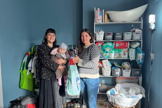 A user of the baby bank, Fran, (left) and Poppy Dent (right). Machynlleth's Baby Bank has been operating for a year, launching in December 2023.