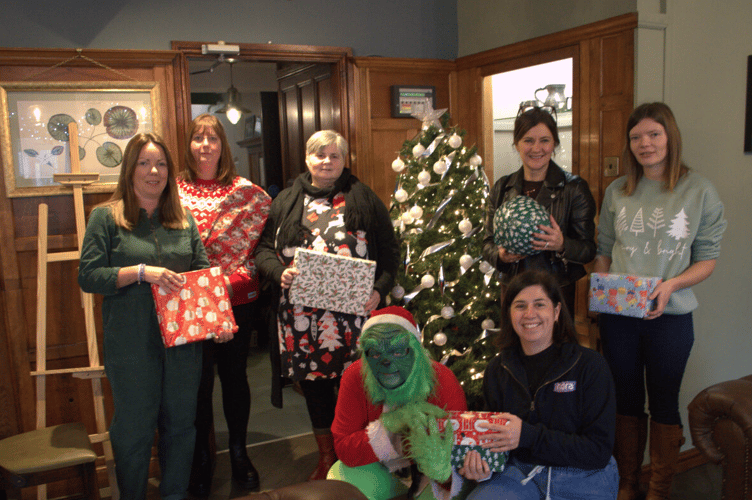Front: Marie Kirkman from Bala as the Grinch Nicola Griffiths  and members of the fostering community