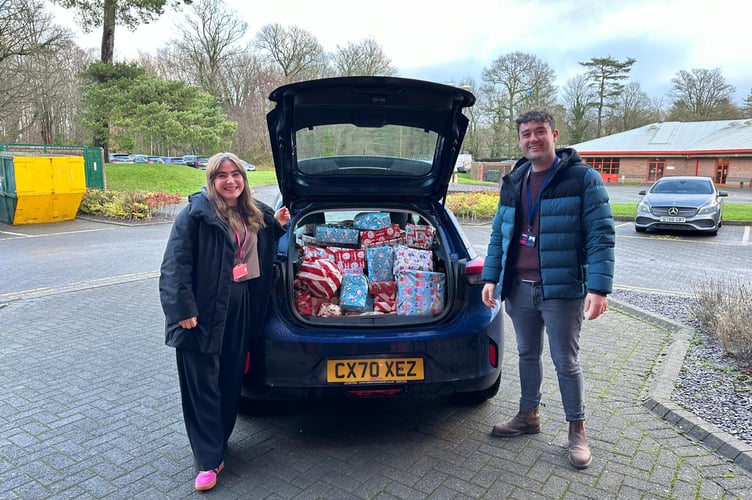 Rich and Gwen from Adra delivering gifts