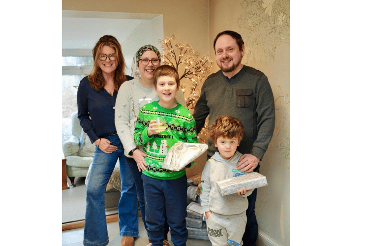 Alan and Rhian Evans from Llanon, runners up, with their children