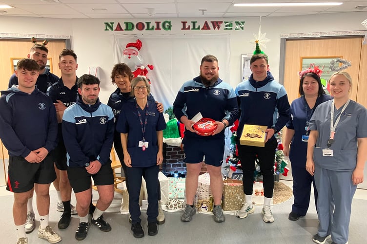 Aber RFC players and board members handed out gifts over the Christmas period