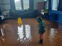 Road closure and hall flooded after heavy rainfall on new year's day
