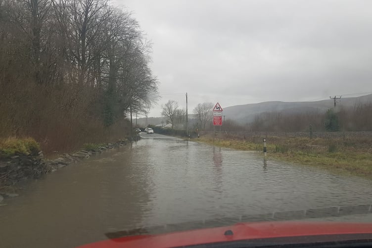 The flooding on the A487 in Derwenlas