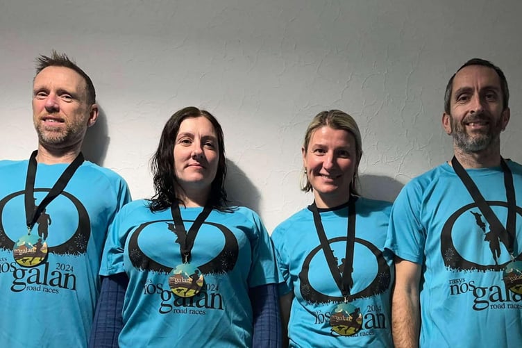 Aber runners with their Ras Nos Galan medals - Shelley, Theresa, Lina and Edd