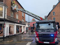 Firefighters remove dangerous window in town centre