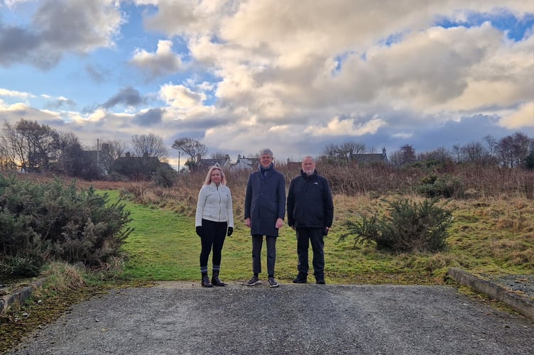 Liz Saville Roberts MP, Cllr Paul Rowlinson and Cllr Gareth Tudor Jones on Maes Twnti site, Morfa Nefyn