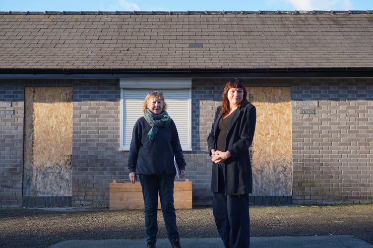 Machynlleth Town Councillors Norma McCarten (left) and Kim Bryan (right) outside the soon-to-be open public toilets