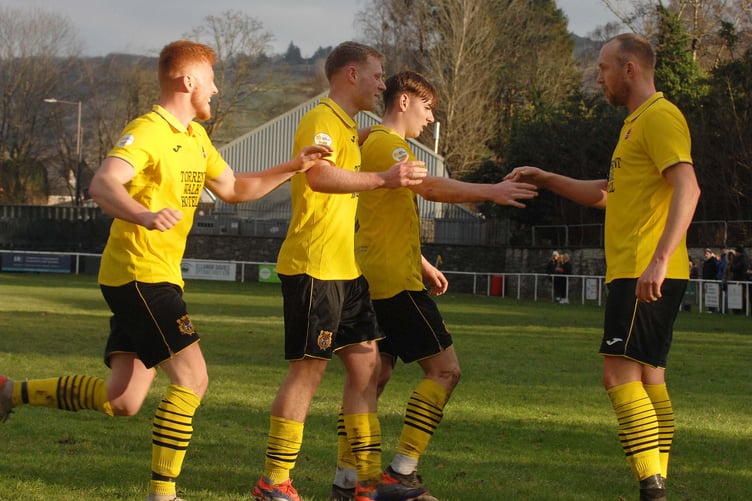 Gerwyn Williams (left) celebrated his return to the side following injury with a goal, created by Paul  Lewis (right)