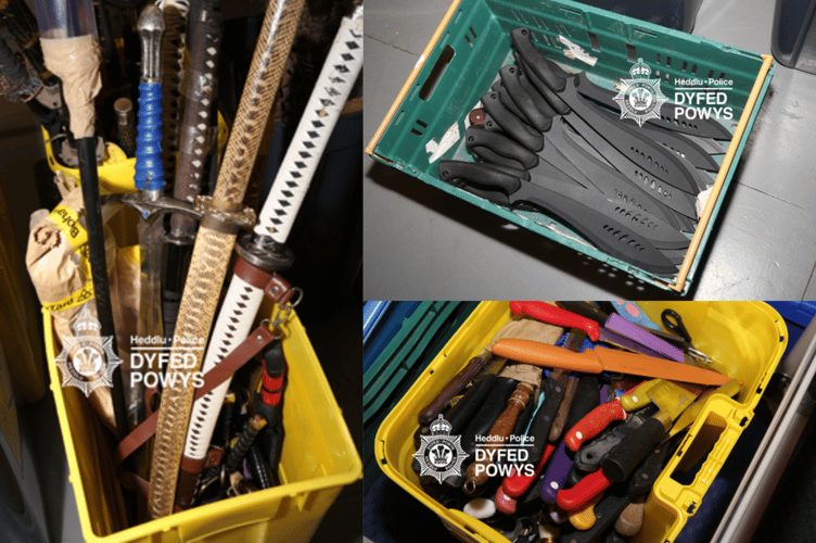 A collection of knives, including samurai swords, machetes, and daggers, destroyed as part of a new initiative to combat knife crime in Dyfed-Powys