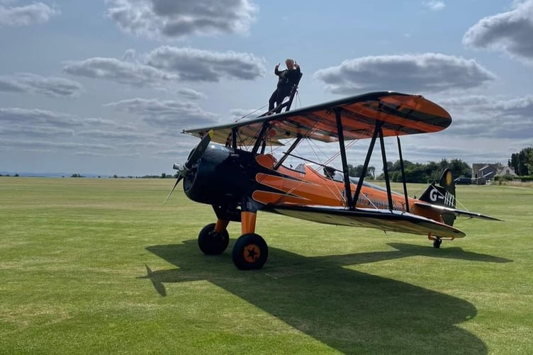 Wendy Thomas strapped in for her first wing-walking flight in Cirencester in August last year