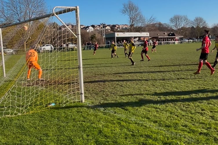 Tom Hilditch's free kick smashes against the bar