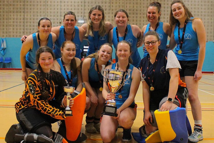 Dysynni Ladies with their trophies. Back row: Ellie Redman, Jo Lewis, Ela Pugh, Alice Bennett, Amelia Dunn, Sian Williams. From row: Alanna Fox, Poppy Ryan, Tilli Papirnyk, Lora Constable (Capt) and Pippa Rollings (Photo: Sue Williams)