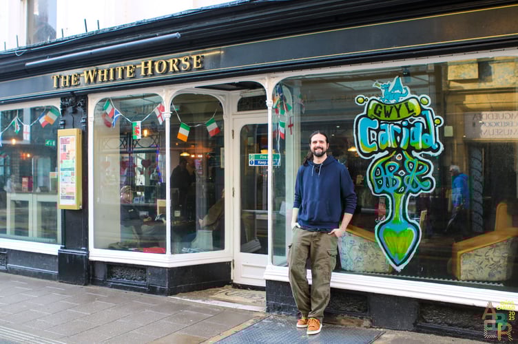 Follow the Gwyl Cariad art trail across the town to find the shop window displays