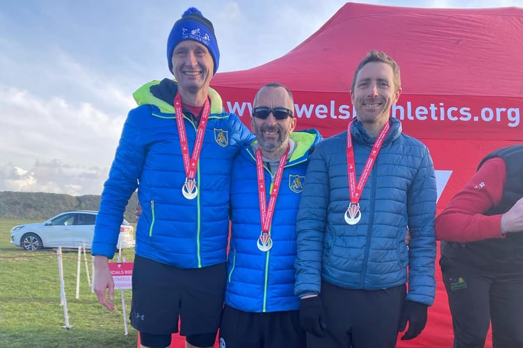 Mark Whitehead, Edd Land and Owain Schiavone celebrating their podium place