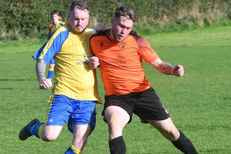 Aled Wyn Jones (right) equalised for Tywyn against Berriew (Flie pic: Doris O'Keefe)