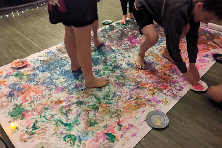 A foot painting session at Machynlleth Youth Club