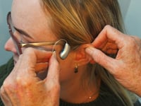 Call for urgent action to address barriers faced by deaf people