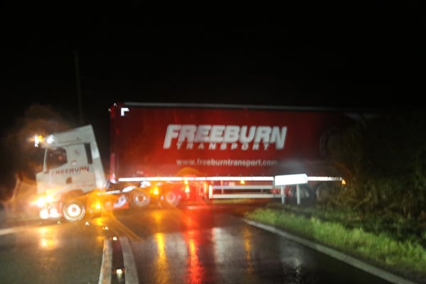 A HGV making a turn after ignoring road closure signs on the A470