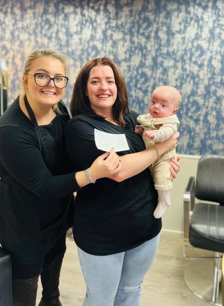Baby Hefin is pictured at five months old with his mother, Lauren, and Studio58 owner, Sophie