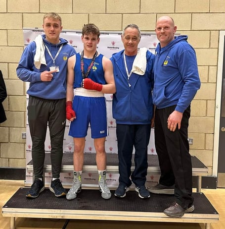 Winning team: Pictured following Cardigan ABC’s latest title triumph at Ebbw Vale are (from left): cornerman Josh Mellor, newly-crowned novice champ Llyr Jones, Cardigan ABC head coach Guy Croft and the boxer’s proud dad, Alan Jones. Image: Supplied.