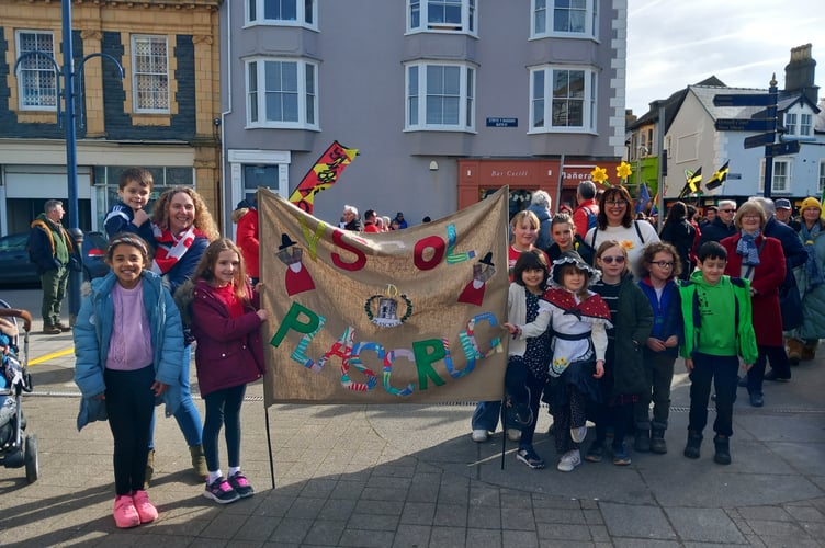 Schools including Ysgol Plascrug joined the parade. Photo: Julie McNicholls Vale