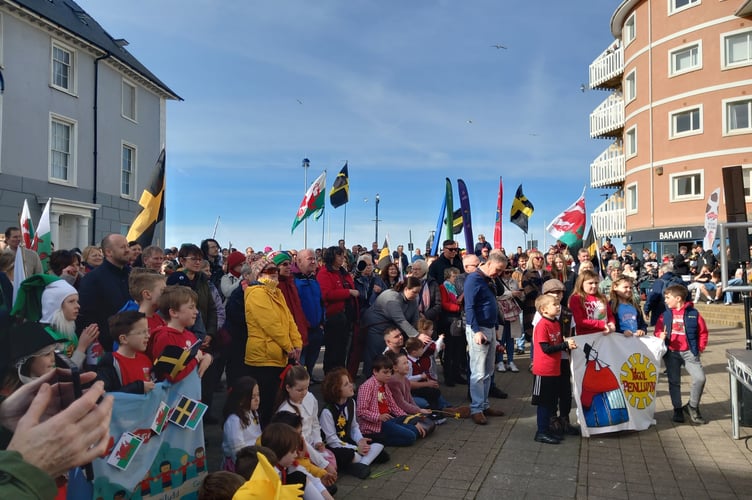 Crowds lined up at the end of the parade to hear from speakers including Jeremy Turner. Photo: Julie McNicholls Vale
