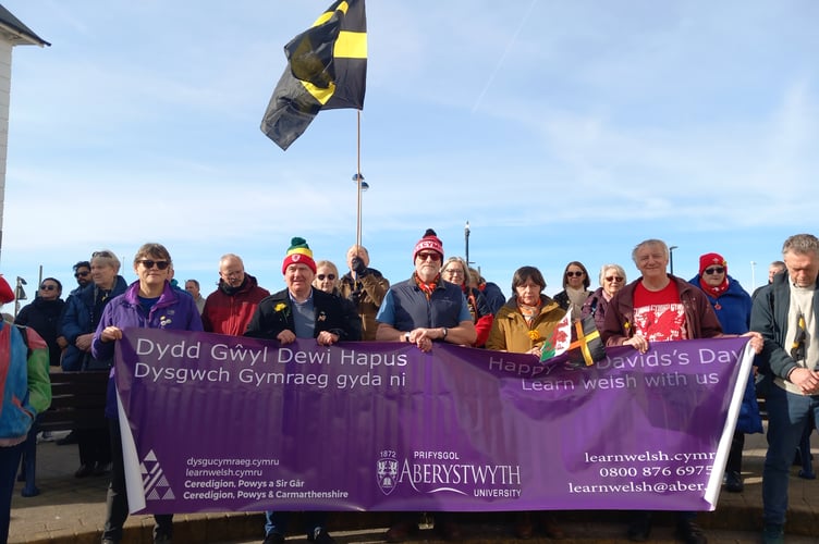 Welsh learners and their tutor, Ioan Guile, second from left, joined the parade. Photo: Julie McNicholls Vale