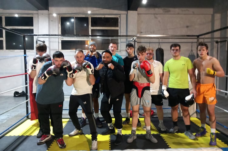 Jason Spencer and Jamie Ambler with some of the members of Jay Jay’s Amateur Boxing Club. Photo: Julie McNicholls Vale