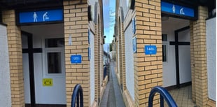 Person removes price sticker from public toilets giving men discount