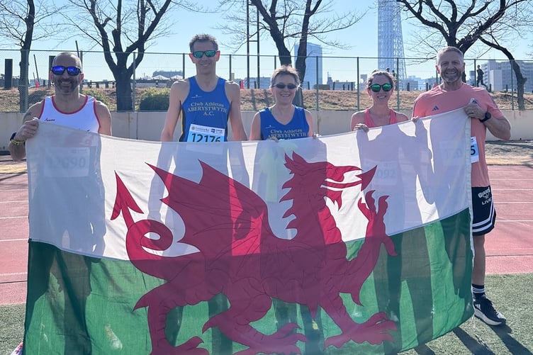 Edd, Paul and Tracey in Tokyo with Paul's partner Julie and Tracey's partner Kristan flying the flag for Wales